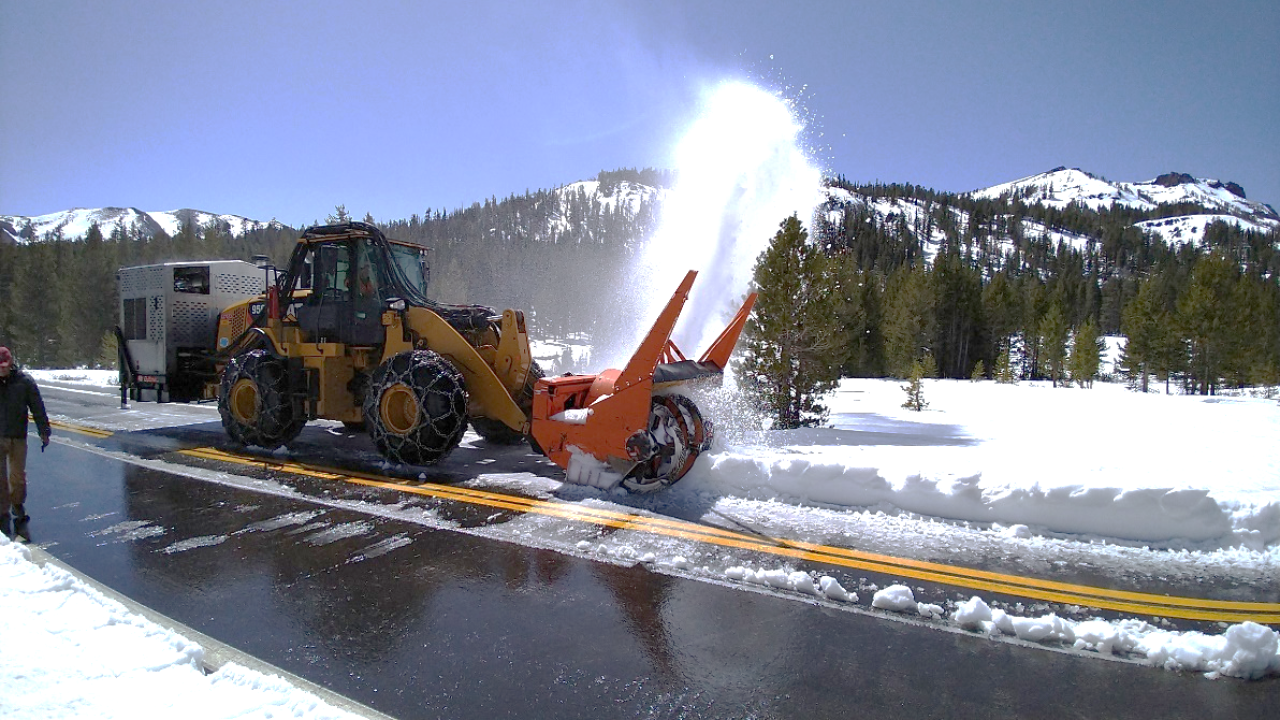 Photo of front loader clearing snow