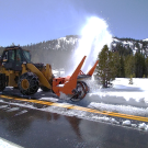 Photo of front loader clearing snow